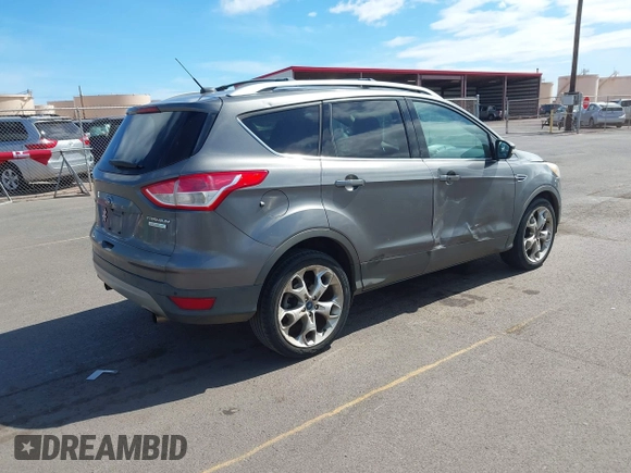 2013 Ford Escape Titanium with VIN 1FMCU0J9XDUC16155, listed as a IAAI auction lot 42373566 with 132,608 mi miles and . Bid and sale history available at DreamBid. Image 4.