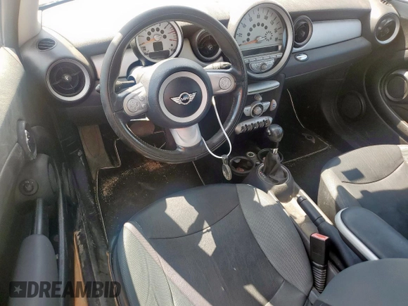 2010 MINI Hardtop with VIN WMWMF3C50ATZ61512, listed as a Copart auction lot 57819095 with 150,848 mi miles and Clean title. Bid and sale history available at DreamBid. Image 8.
