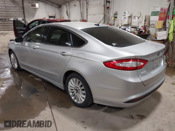 2014 Ford Fusion SE Hybrid with VIN 3FA6P0LU8ER183231, listed as a IAAI auction lot 41848377 with 130,496 mi miles. Bid and sale history available at carsss.com. Image 3.