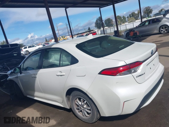 2021 Toyota Corolla Hybrid LE with VIN JTDEAMDE7MJ012694, listed as a IAAI auction lot 41794233 with 103,363 mi miles. Bid and sale history available at carsss.com. Image 15.