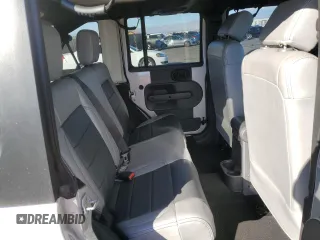 2007 Jeep Wrangler Unlimited Sahara with VIN 1J4GB59197L144781, listed as a Copart auction lot 48678315 with 137,538 mi miles and Salvage title. Bid and sale history available at DreamBid. Image 11.