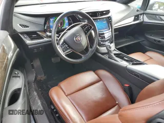 2014 Cadillac ELR z VIN 1G6RS1E46EU601838, wystawiony jako Copart lot #56005485 z przebiegiem 101 201 mil mil oraz Szkoda całkowita • Salvage title. Historia ofert i sprzedaży dostępna na DreamBid. Obrazek 8.