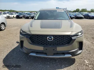 2023 Mazda CX-50 2.5 Turbo Meridian Edition with VIN 7MMVABXY8PN127764, listed as a Copart auction lot 68353004 with 24,209 mi miles and Salvage Title. Bid and sale history available at carsss.com. Image 5.