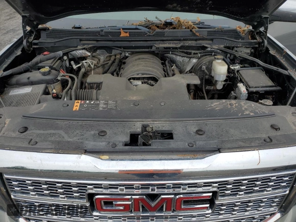 2017 GMC Sierra 1500 Denali z VIN 3GTU2PEJ1HG293825, wystawiony jako Copart lot #56851725 z przebiegiem 91 439 mil mil oraz Szkoda całkowita • Salvage title. Historia ofert i sprzedaży dostępna na DreamBid. Obrazek 11.