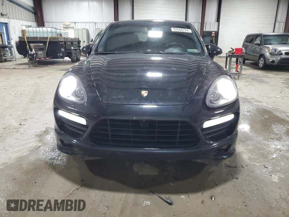 2012 Porsche Cayenne Turbo z VIN WP1AC2A21CLA84144, wystawiony jako Copart lot #82688294 z przebiegiem 124 143 mil mil oraz Szkoda całkowita • Salvage title. Historia ofert i sprzedaży dostępna na DreamBid. Obrazek 5.