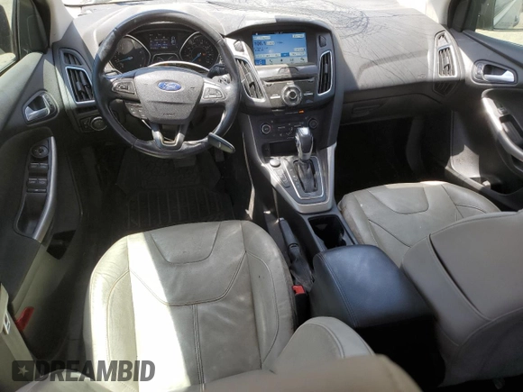 2016 Ford Focus Titanium z VIN 1FADP3J2XGL319399, wystawiony jako Copart lot #59258745 z przebiegiem 215 296 mil mil oraz Szkoda całkowita • Salvage title. Historia ofert i sprzedaży dostępna na DreamBid. Obrazek 8.