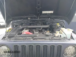 1997 Jeep Wrangler Sport with VIN 1J4FY19S2VP481780, listed as a IAAI auction lot 41822213 with 156,629 mi miles. Bid and sale history available at carsss.com. Image 10.
