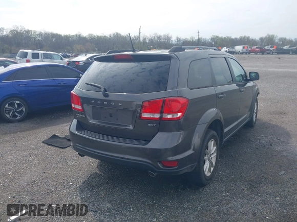 2017 Dodge Journey SXT with VIN 3C4PDDBG5HT618563, listed as a IAAI auction lot 42015188 with 104,747 mi miles and . Bid and sale history available at DreamBid. Image 4.