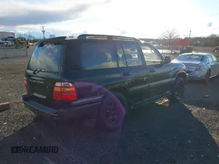 2000 Toyota Land Cruiser with VIN JT3HT05J7Y0110667, listed as a IAAI auction lot 41248220 with 208,043 mi miles. Bid and sale history available at carsss.com. Image 4.