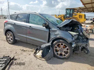 2016 Ford Escape Titanium с VIN 1FMCU9J97GUB28172, выставлен на аукционе Copart как лот 59658095 с пробегом Не указан миль и Списание • Salvage title. История ставок и продаж доступна на DreamBid. Изображение 4.