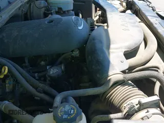 2003 Chevrolet Tahoe LS with VIN 1GNEC13TX3J252997, listed as a IAAI auction lot 42504734 with 118,972 mi miles and . Bid and sale history available at DreamBid. Image 20.