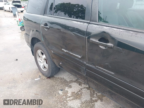 2007 Honda Pilot EX-L with VIN 5FNYF28577B028130, listed as a IAAI auction lot 42434714 with 179,299 mi miles and . Bid and sale history available at DreamBid. Image 6.