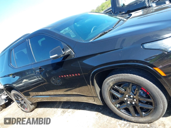 2023 Chevrolet Traverse Premier with VIN 1GNERKKW5PJ128805, listed as a IAAI auction lot 42032622 with 36,463 mi miles and . Bid and sale history available at DreamBid. Image 13.