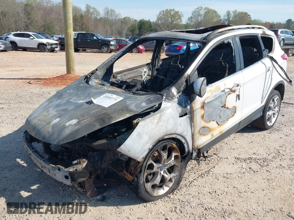 2015 Ford Escape Titanium с VIN 1FMCU9J90FUA48002, выставлен на аукционе IAAI как лот 41890275 с пробегом Не указан миль и . История ставок и продаж доступна на DreamBid. Изображение 2.