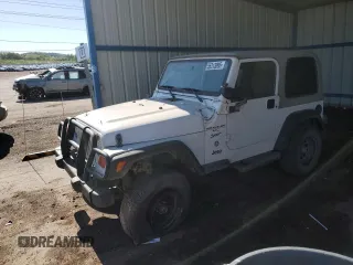 1998 Jeep Wrangler Sport z VIN 1J4FY19S4WP706363, wystawiony jako Copart lot #55313095 z przebiegiem 86 058 mil mil oraz Szkoda całkowita • Salvage title. Historia ofert i sprzedaży dostępna na DreamBid. Obrazek 1.