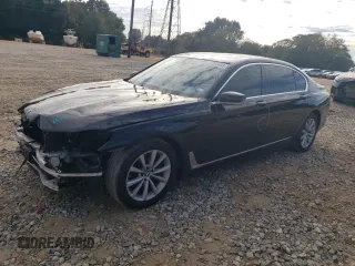 2018 BMW 7 Series 740i xDrive with VIN WBA7E4C5XJGV24003, listed as a Copart auction lot 71395443 with 63,558 mi miles. Bid and sale history available at carsss.com. Image 1.