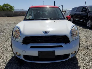 2013 MINI Countryman S ALL4 z VIN WMWZC5C56DWM16296, wystawiony jako Copart lot #56985615 z przebiegiem 63 858 mil mil oraz Szkoda całkowita • Salvage title. Historia ofert i sprzedaży dostępna na DreamBid. Obrazek 5.