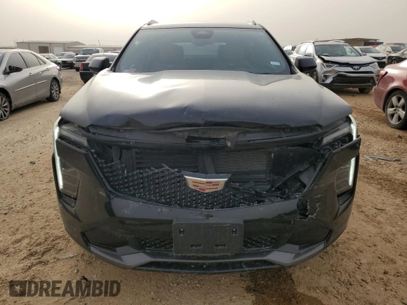 2024 Cadillac XT4 FWD Sport with VIN 1GYFZER46RF100076, listed as a Copart auction lot 45741285 with 11,616 mi miles and Salvage title. Bid and sale history available at DreamBid. Image 5.