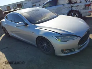 2013 Tesla Model S with VIN 5YJSA1CNXDFP05737, listed as a IAAI auction lot 41726561 with 144,320 mi miles. Bid and sale history available at carsss.com. Image 1.