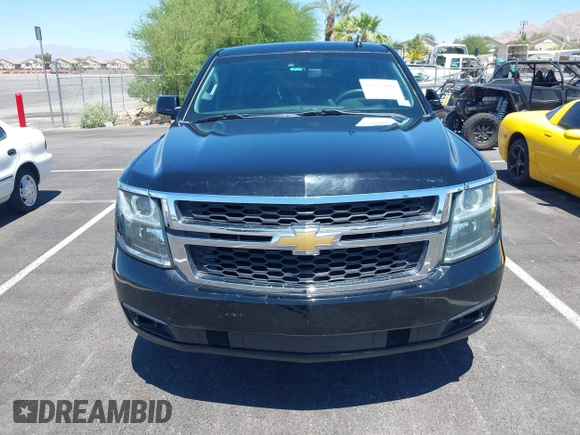 2015 Chevrolet Tahoe Commercial z VIN 1GNLC2EC0FR629983, wystawiony jako IAAI lot #42825604 z przebiegiem 112 410 mil mil oraz . Historia ofert i sprzedaży dostępna na DreamBid. Obrazek 12.