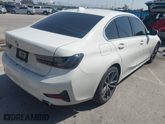 2019 BMW 3 Series 330i with VIN WBA5R1C50KFH26305, listed as a IAAI auction lot 41965645 with 71,150 mi miles and . Bid and sale history available at DreamBid. Image 4.