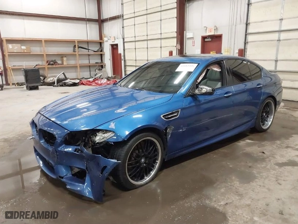 2013 BMW M5 with VIN WBSFV9C58DC772251, listed as a IAAI auction lot 41682321 with NaN miles. Bid and sale history available at carsss.com. Image 2.