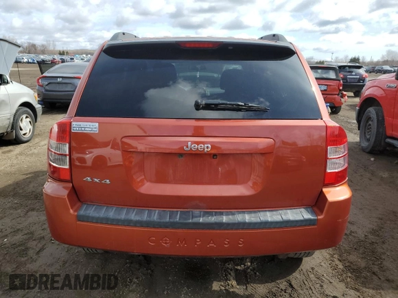 2010 Jeep Compass North Edition with VIN 1J4NF4FB0AD630982, listed as a Copart auction lot 50602465 with 233,513 mi miles and Clean Title. Bid and sale history available at carsss.com. Image 6.