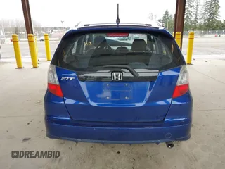 2009 Honda Fit Sport with VIN JHMGE88459C001743, listed as a IAAI auction lot 41852048 with 128,225 mi miles. Bid and sale history available at carsss.com. Image 17.