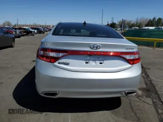 2014 Hyundai Azera Limited z VIN KMHFH4JG0EA410865, wystawiony jako Copart lot #50583525 z przebiegiem Nie podano mil oraz Szkoda całkowita • Salvage title. Historia ofert i sprzedaży dostępna na DreamBid. Obrazek 6.