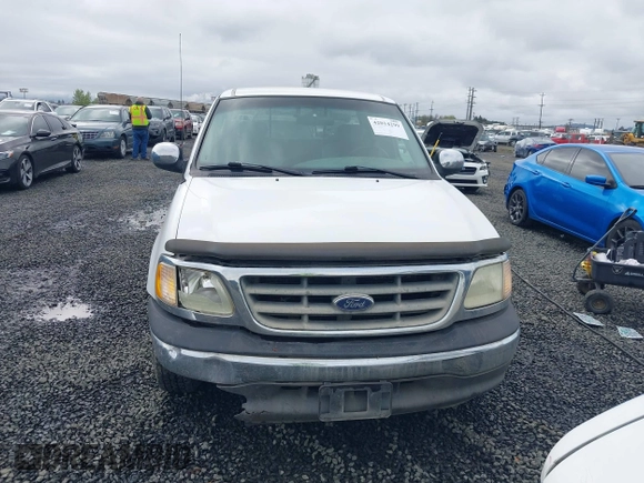 2002 Ford F-150 XL с VIN 1FTRX17W62NB90220, выставлен на аукционе IAAI как лот 42014299 с пробегом 219 264 миль миль и . История ставок и продаж доступна на DreamBid. Изображение 12.