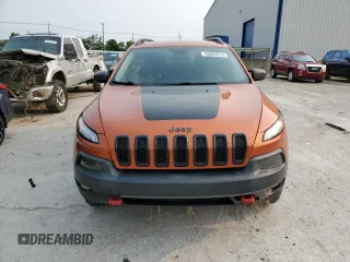 2015 Jeep Cherokee Trailhawk with VIN 1C4PJMBS0FW675807, listed as a Copart auction lot 58800615 with 109,019 mi miles and Salvage title. Bid and sale history available at DreamBid. Image 5.