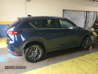 2021 Mazda CX-5 Touring with VIN JM3KFACMXM0334139, listed as a Copart auction lot 55362905 with 117,279 mi miles and Clean Title. Bid and sale history available at DreamBid. Image 3.