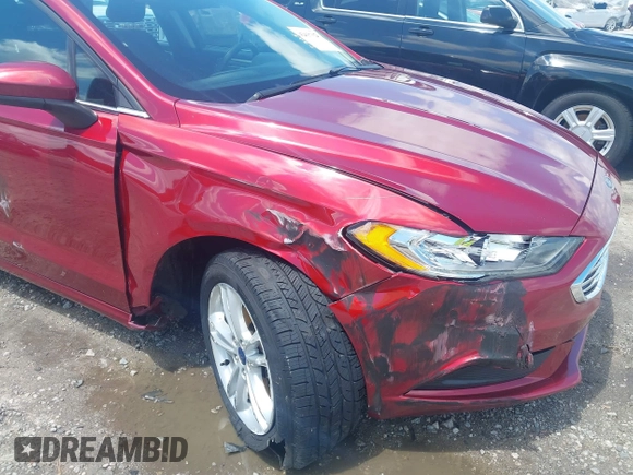 2018 Ford Fusion SE with VIN 3FA6P0HD7JR258701, listed as a IAAI auction lot 42637023 with 150,471 mi miles and . Bid and sale history available at DreamBid. Image 6.