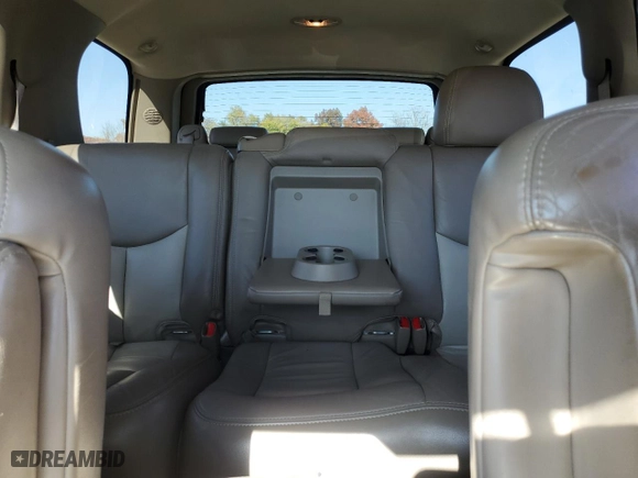 2005 GMC Yukon Denali with VIN 1GKEK63U75J163204, listed as a Copart auction lot 77300834 with 92,096 mi miles and Salvage Title. Bid and sale history available at carsss.com. Image 10.