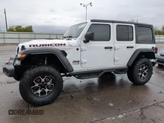 2020 Jeep Wrangler Unlimited Rubicon z VIN 1C4HJXFN1LW335751, wystawiony jako Copart lot #54242215 z przebiegiem 74 961 mil mil oraz Szkoda całkowita • Salvage title. Historia ofert i sprzedaży dostępna na DreamBid. Obrazek 1.