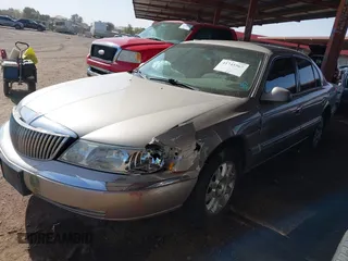 2002 Lincoln Continental with VIN 1LNHM97V62Y696179, listed as a IAAI auction lot 41745567 with 110,514 mi miles and . Bid and sale history available at DreamBid. Image 6.