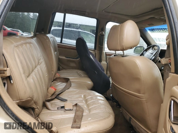 1999 Jeep Grand Cherokee Limited with VIN 1J4GW68N2XC581746, listed as a Copart auction lot 45413775 with 284,226 mi miles and Salvage Title. Bid and sale history available at carsss.com. Image 11.