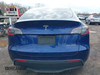 2023 Tesla Model Y Long Range with VIN 7SAYGDEE4PF891709, listed as a IAAI auction lot 41944893 with 15,864 mi miles. Bid and sale history available at carsss.com. Image 16.