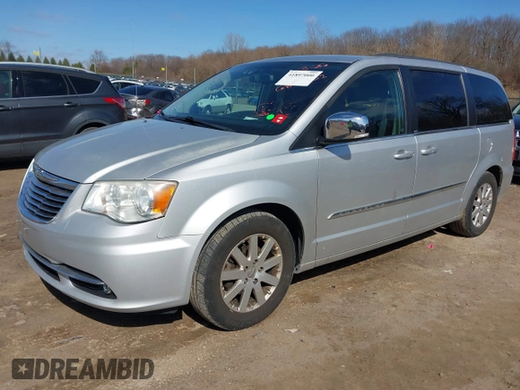 2011 Chrysler Town & Country Touring L with VIN 2A4RR8DG6BR682131, listed as a IAAI auction lot 41897000 with 137,673 mi miles and . Bid and sale history available at DreamBid. Image 2.