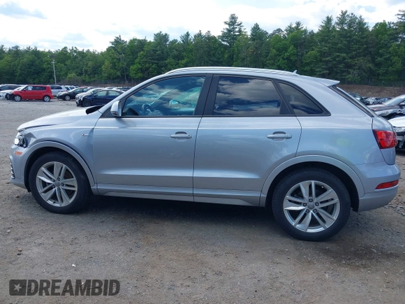 2018 Audi Q3 Premium with VIN WA1ECCFS0JR022112, listed as a IAAI auction lot 42356014 with 56,671 mi miles and . Bid and sale history available at DreamBid. Image 14.