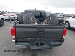 2017 Toyota Tacoma SR5 with VIN 3TMDZ5BN1HM021526, listed as a IAAI auction lot 42204091 with 82,802 mi miles and . Bid and sale history available at DreamBid. Image 17.
