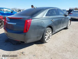 2017 Cadillac XTS Luxury with VIN 2G61M5S32H9159250, listed as a IAAI auction lot 41851329 with 129,944 mi miles. Bid and sale history available at carsss.com. Image 4.
