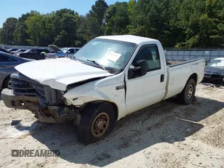 1999 Ford Super Duty F-250 XL with VIN 1FTNF20L3XEC76809, listed as a IAAI auction lot 40153294 with 457,050 mi miles. Bid and sale history available at carsss.com. Image 2.