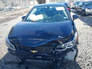 2017 Chevrolet Cruze LS z VIN 1G1BC5SM5H7277073, wystawiony jako IAAI lot #41336306 z przebiegiem 95 515 mil mil oraz . Historia ofert i sprzedaży dostępna na DreamBid. Obrazek 13.