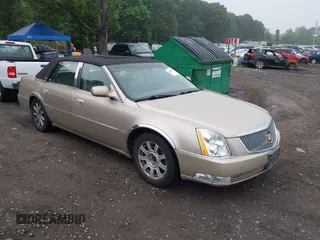 2006 Cadillac DTS 1SC z VIN 1G6KD57Y16U171740, wystawiony jako IAAI lot #42468595 z przebiegiem 139 203 mil mil oraz . Historia ofert i sprzedaży dostępna na DreamBid. Obrazek 1.