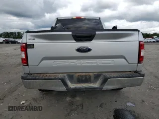 2018 Ford F-150 XL with VIN 1FTEX1EB4JKD24981, listed as a Copart auction lot 56063335 with 190,135 mi miles and Salvage title. Bid and sale history available at DreamBid. Image 6.