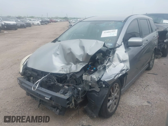 2012 Mazda 5 Touring with VIN JM1CW2CL9C0128075, listed as a IAAI auction lot 41886362 with 139,262 mi miles and . Bid and sale history available at carsss.com. Image 2.
