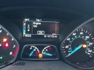2014 Ford Focus Titanium with VIN 1FADP3J24EL439065, listed as a IAAI auction lot 40868973 with 167,739 mi miles. Bid and sale history available at carsss.com. Image 7.