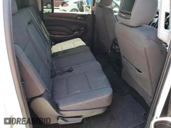 2017 Chevrolet Suburban LS с VIN 1GNSCGKC8HR305762, выставлен на аукционе Copart как лот 57514275 с пробегом 111 928 миль миль и Списание • Salvage title. История ставок и продаж доступна на DreamBid. Изображение 11.