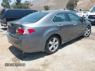 2010 Acura TSX z VIN JH4CU2F64AC033946, wystawiony jako IAAI lot #42544399 z przebiegiem 120 477 mil mil oraz . Historia ofert i sprzedaży dostępna na DreamBid. Obrazek 4.